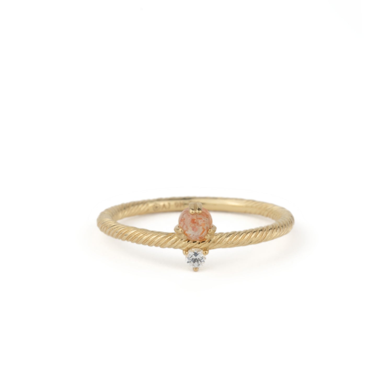 Daybreak Ring with sunstone and sapphire, the photography system revealing gemstone depth
