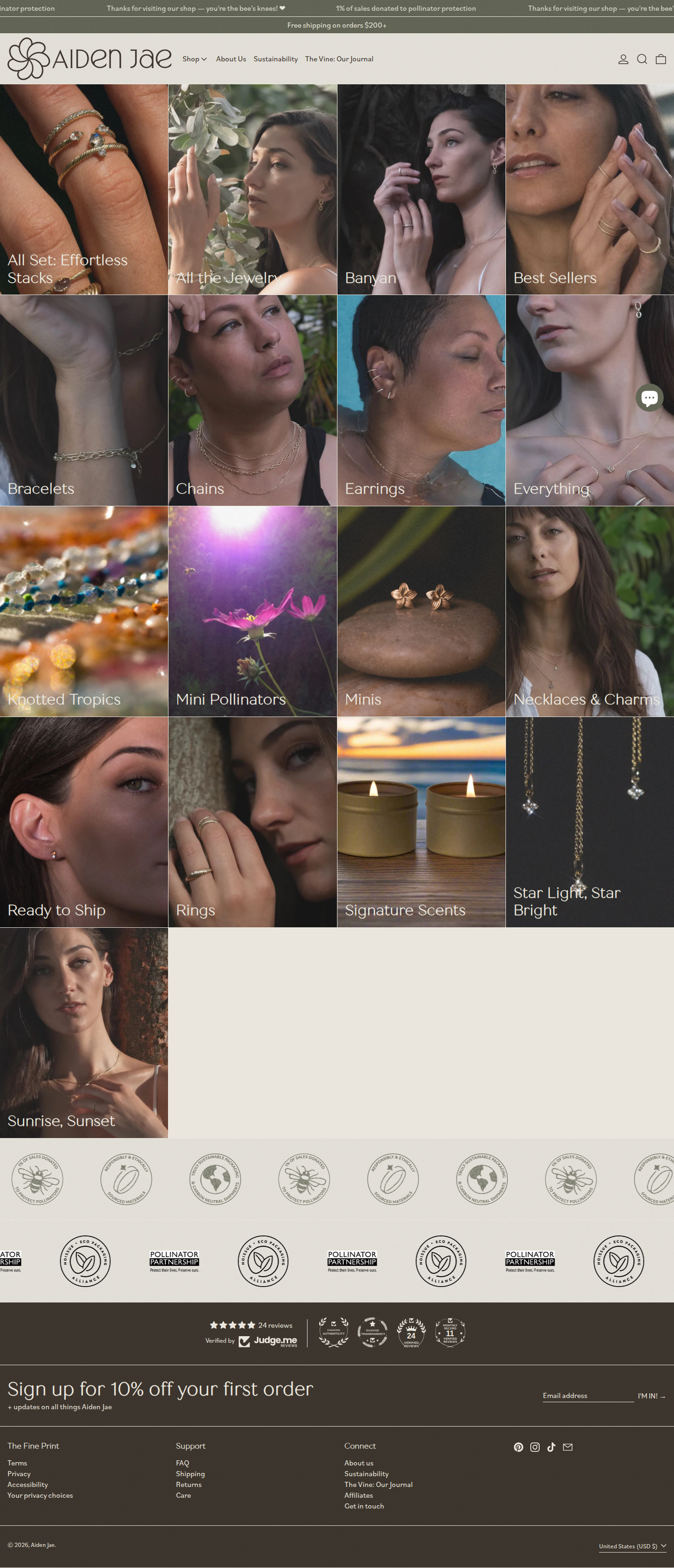 Aiden Jae collections page, the grid system organizing seventeen collections while maintaining visual coherence
